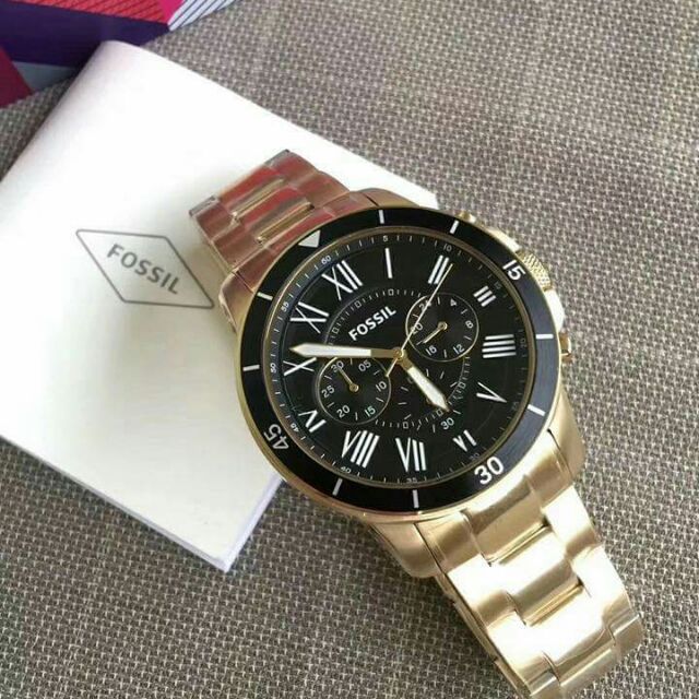 Fossil Grant Sport watch with Fossil tag and packaging