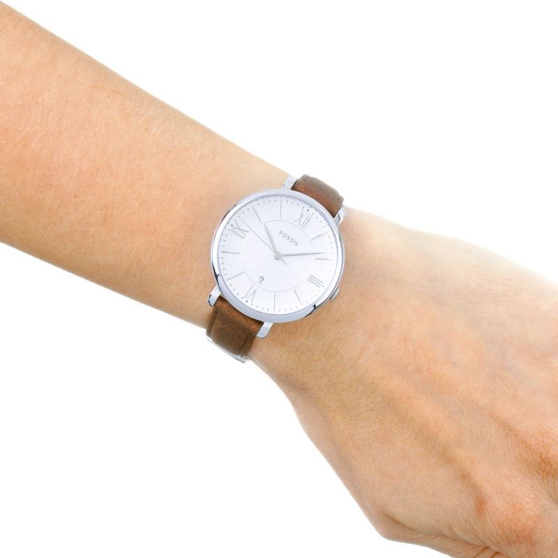 Fossil Jacqueline ladies watch on wrist showing silver dial and tan leather band