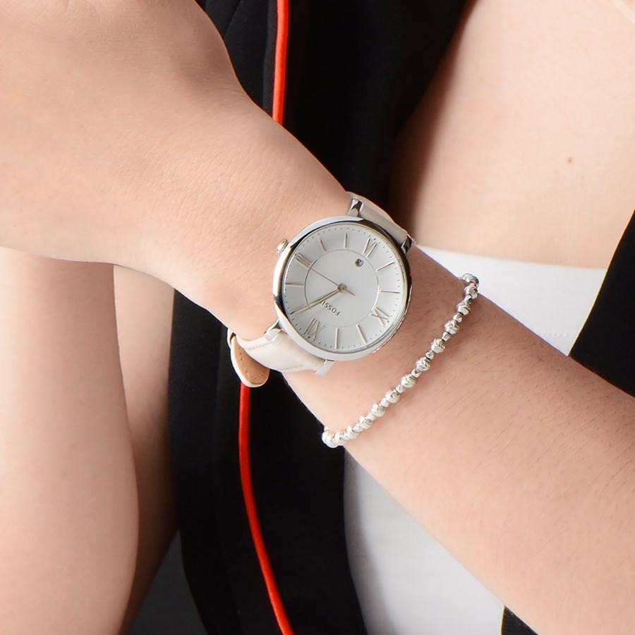 Fossil Jacqueline white dial watch styled on wrist with beaded bracelet