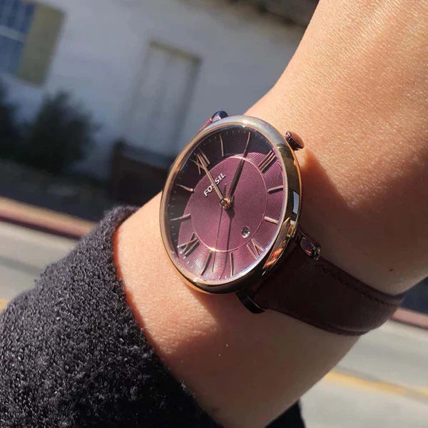 Fossil Jacqueline ES4099 watch worn on wrist, displaying burgundy dial and wine leather strap