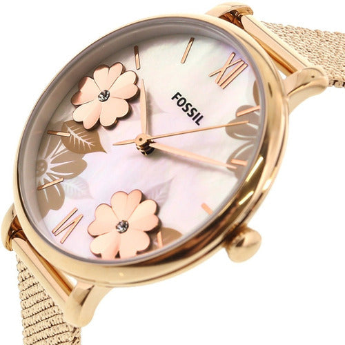 Fossil Jacqueline watch at angle showing mother of pearl dial with floral motif and Roman numerals