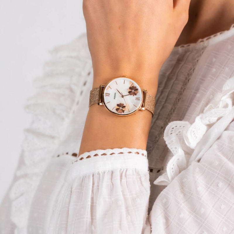 Fossil Jacqueline women's watch worn on wrist showing mother of pearl dial with flowers