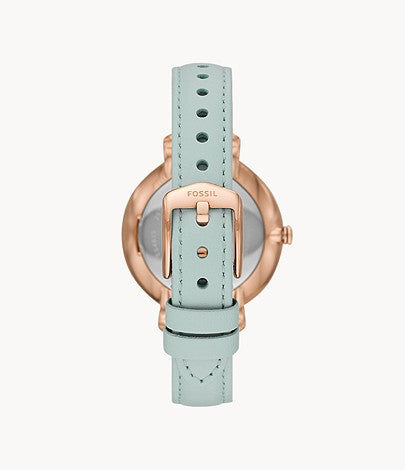 Back view of Fossil Jacqueline watch showing caseback with mint green leather strap and rose gold case
