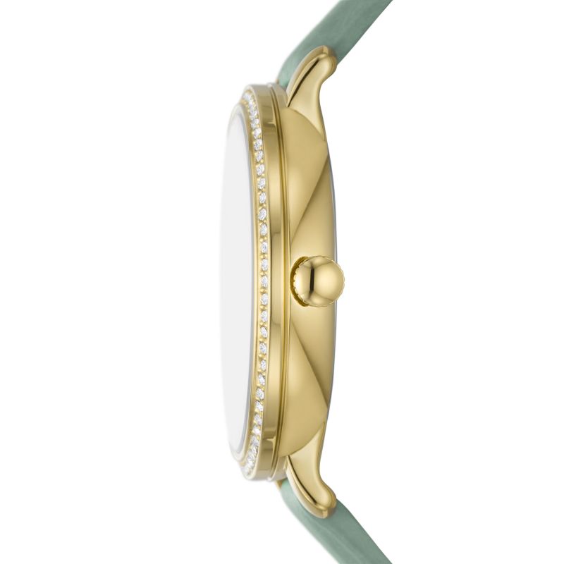 Side view of Fossil Jacqueline watch showing gold-tone case and green leather strap profile
