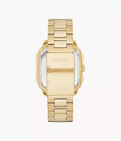 Fossil Machine Chrono watch caseback showing engraved FOSSIL branding on gold stainless steel