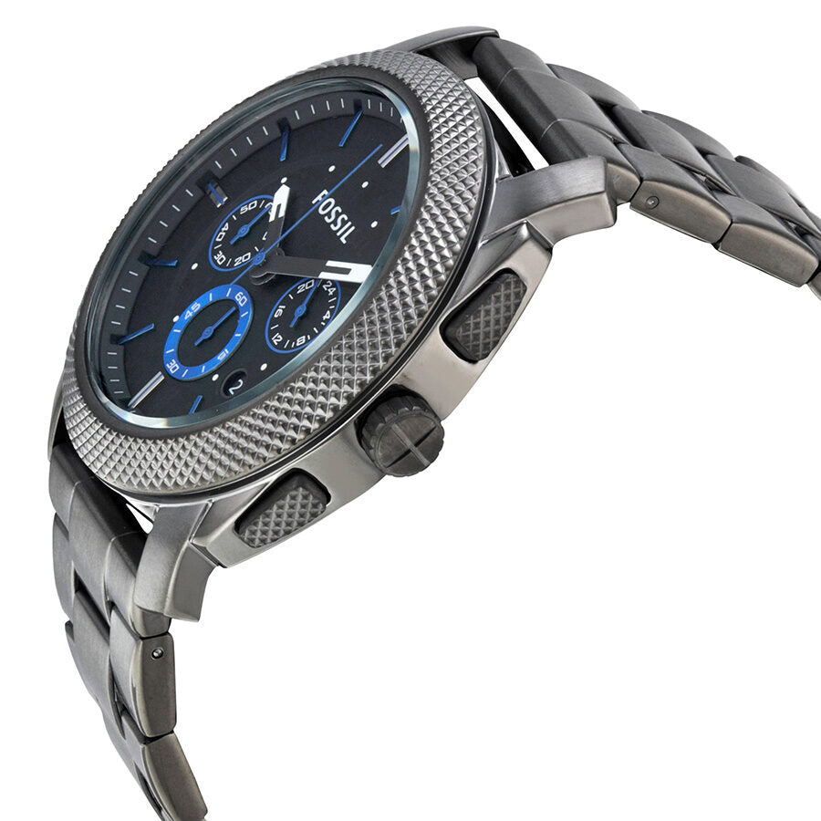 Fossil Machine Chronograph watch with textured bezel and stainless steel band, angle view