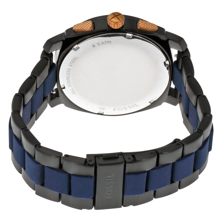 Fossil Machine watch caseback showing stainless steel case and two-tone blue/gunmetal bracelet construction