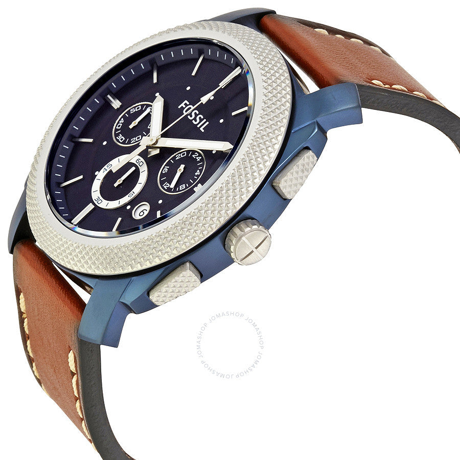 Angled view of Fossil Machine chronograph watch with blue case, cream bezel, and brown strap