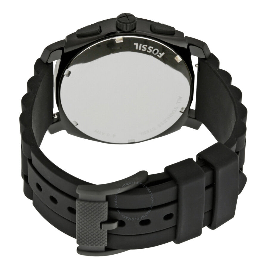 Fossil Machine watch caseback showing stainless steel back and silicone strap