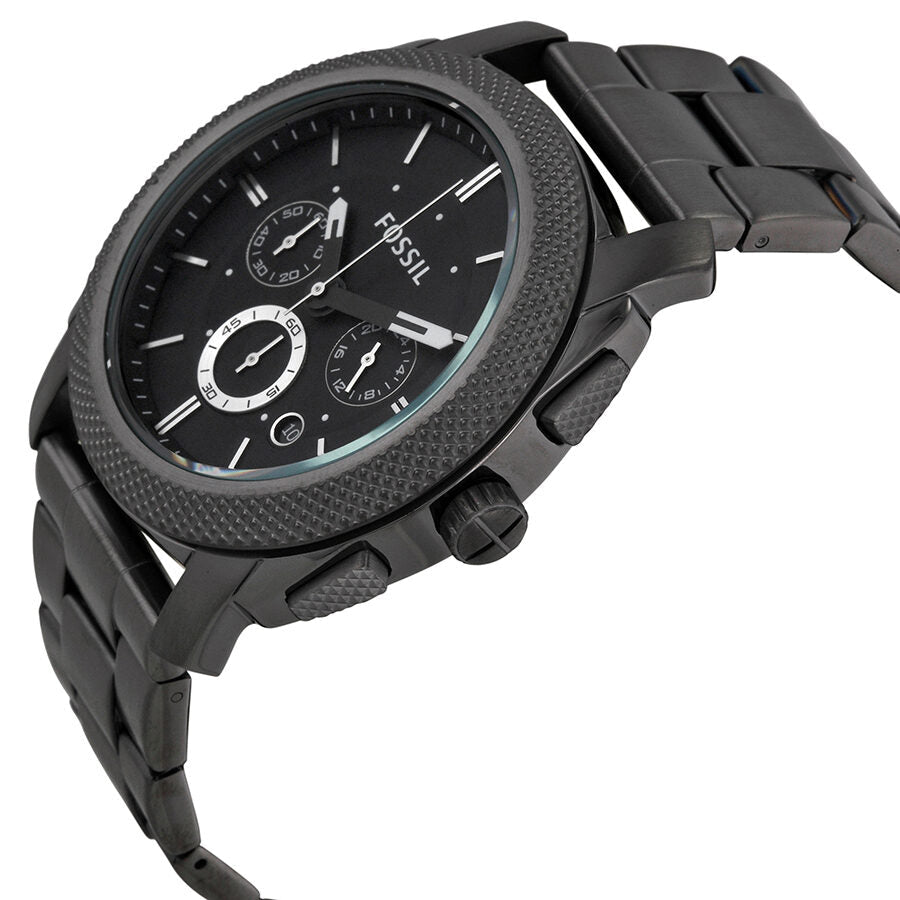 Fossil Machine chronograph displayed at angle showing black case, dial with three subdials, and metal bracelet