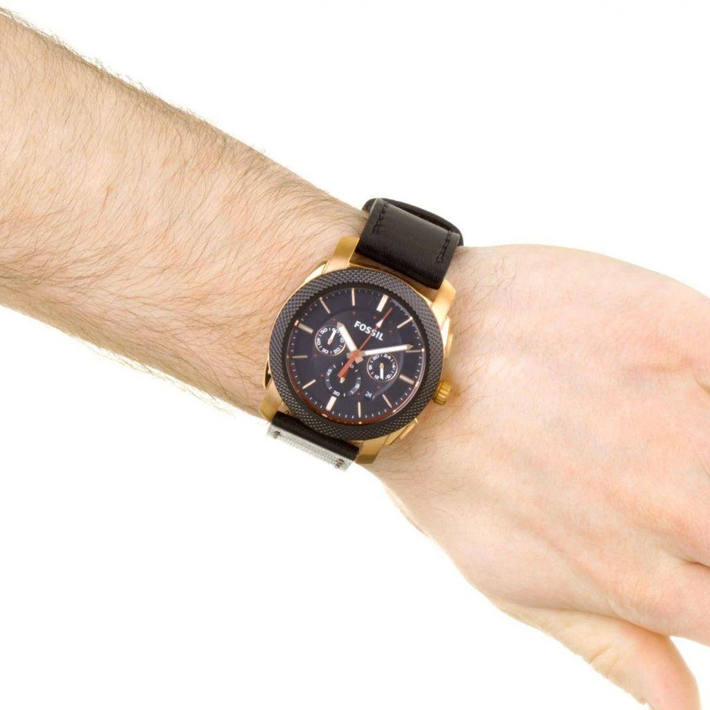Wrist view of Fossil Machine watch showing fit and styling with black leather band