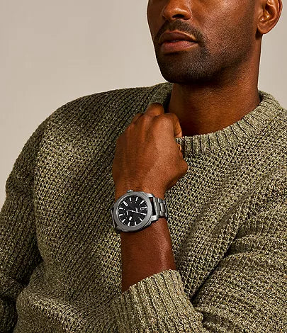 Fossil Machine FS5970 watch worn on wrist with smoke stainless steel band