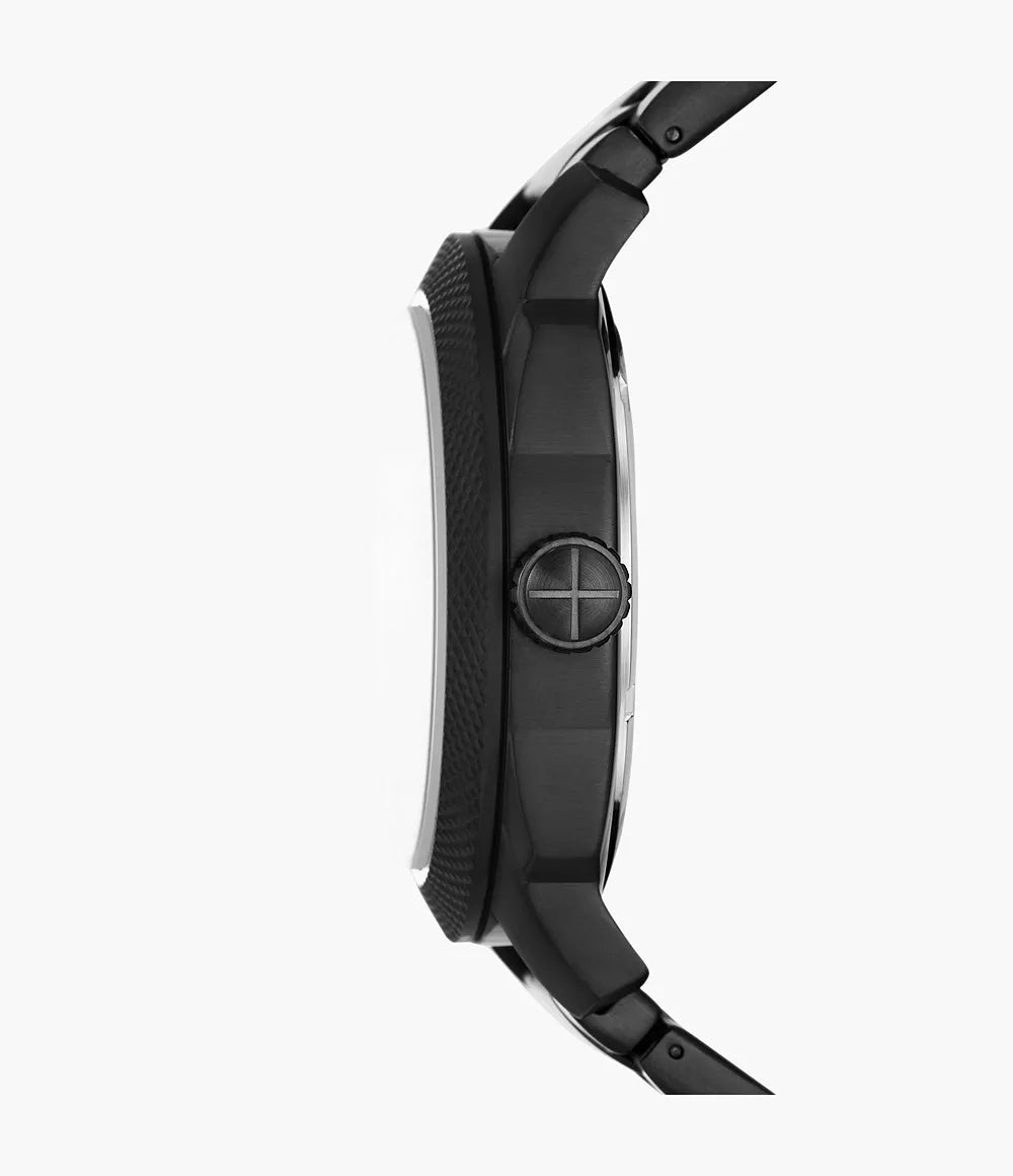 Fossil Machine watch side profile showing case thickness and black stainless steel bracelet