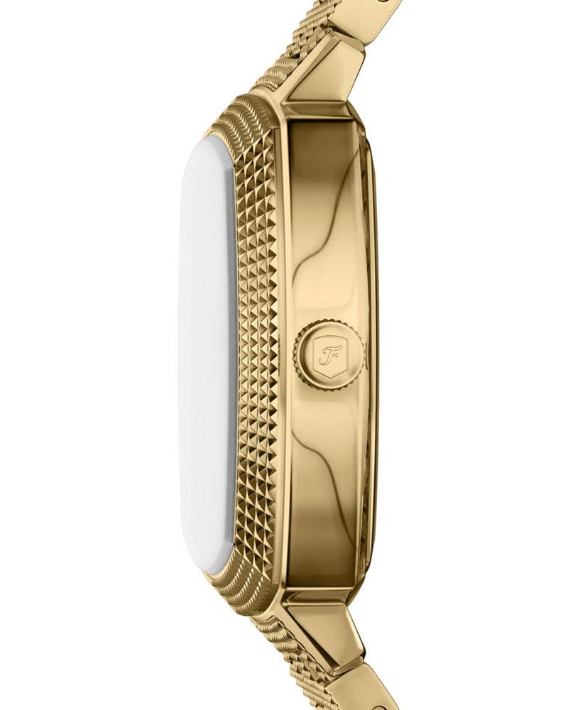 Side view of gold-tone watch showing case profile and mesh bracelet