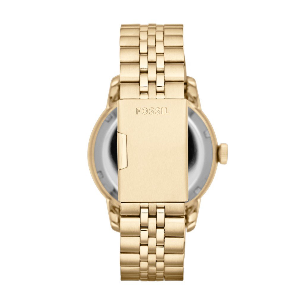 Fossil ME1137 caseback view showing transparent window and Fossil branding on strap