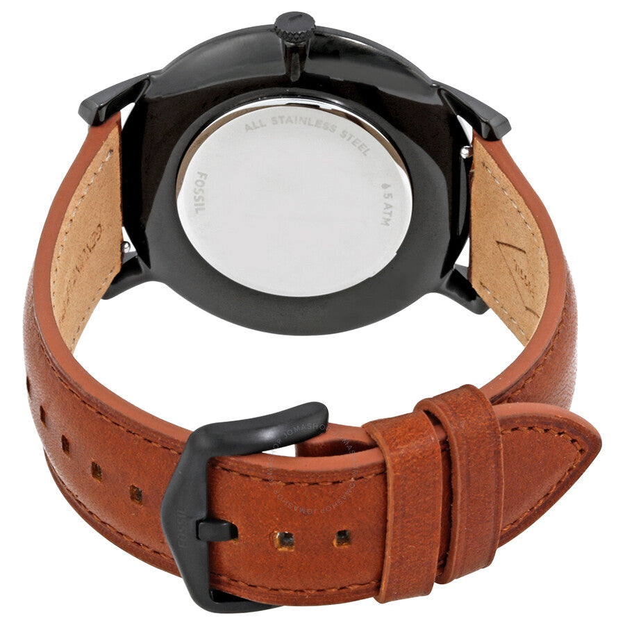 Caseback view showing brown leather strap with black buckle and stainless steel case