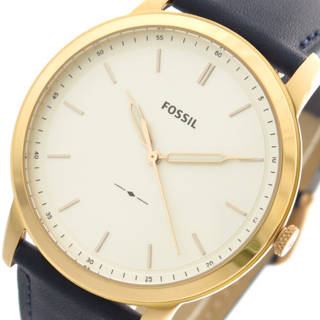 Close-up detail of Fossil Minimalist watch dial with rose gold hands and hour markers