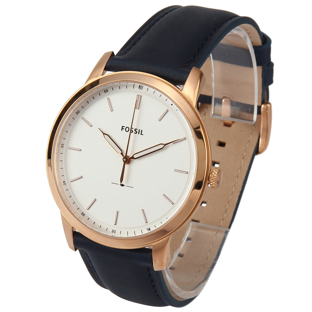 Fossil Minimalist Slim watch worn on wrist showing white dial and blue leather strap