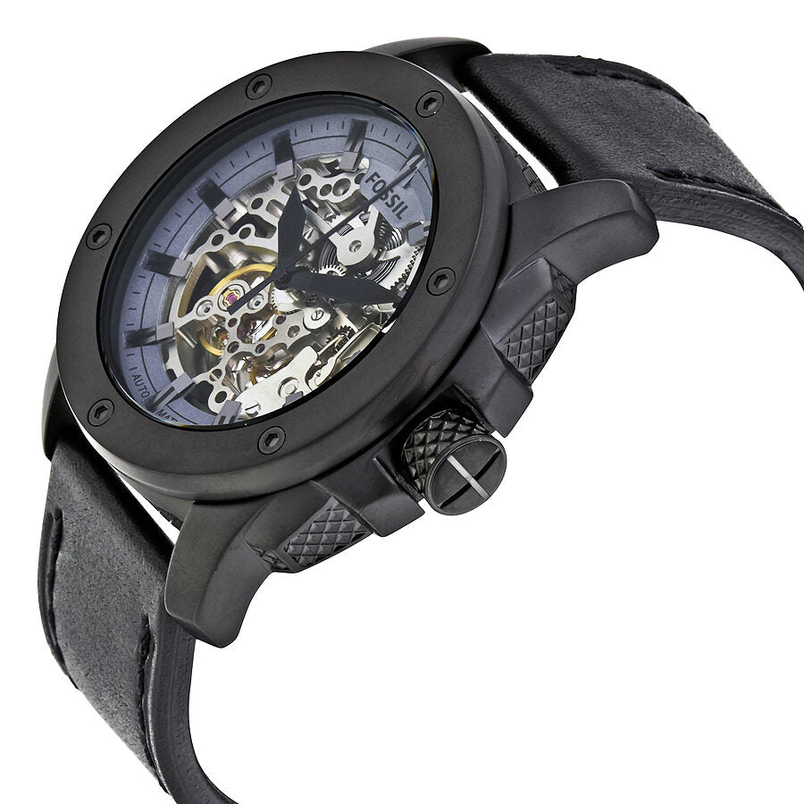 Angled side view of Fossil Modern Machine watch showing skeleton dial and black leather strap