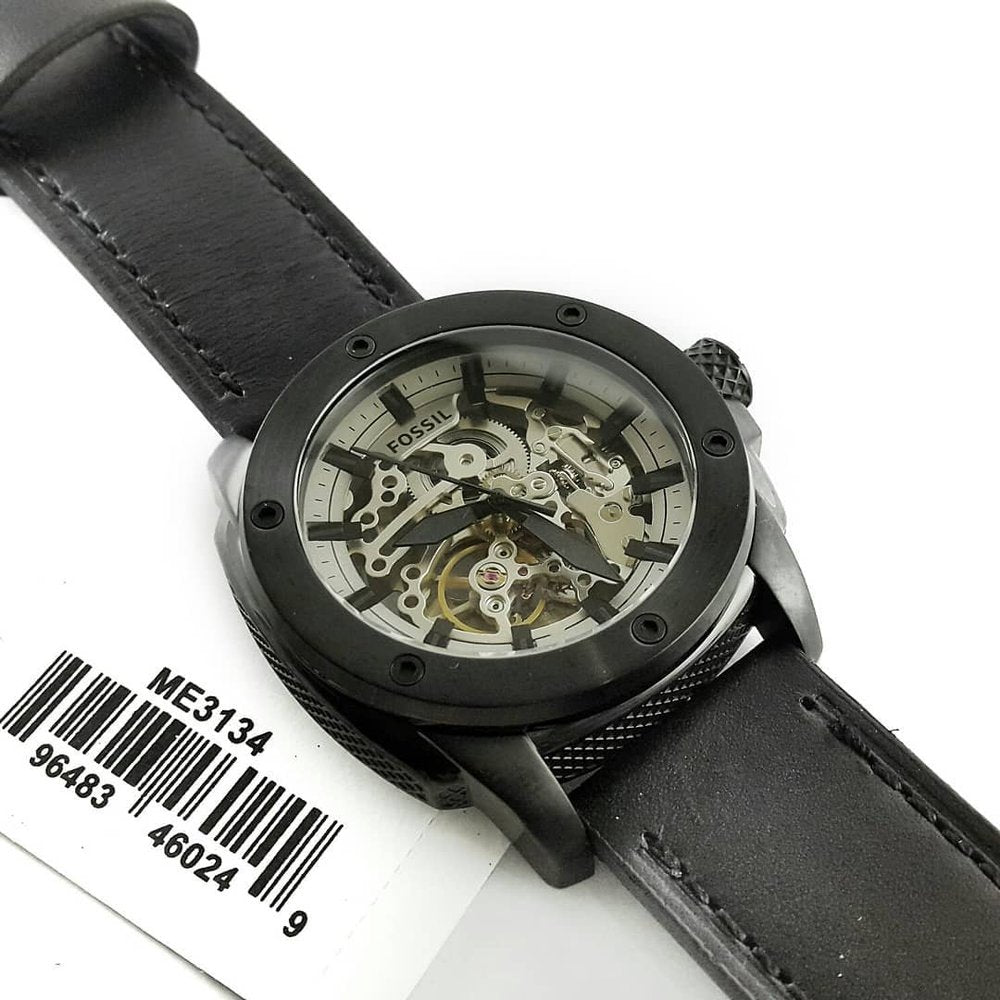 Fossil Modern Machine automatic skeleton watch on wrist with model number ME3134 visible