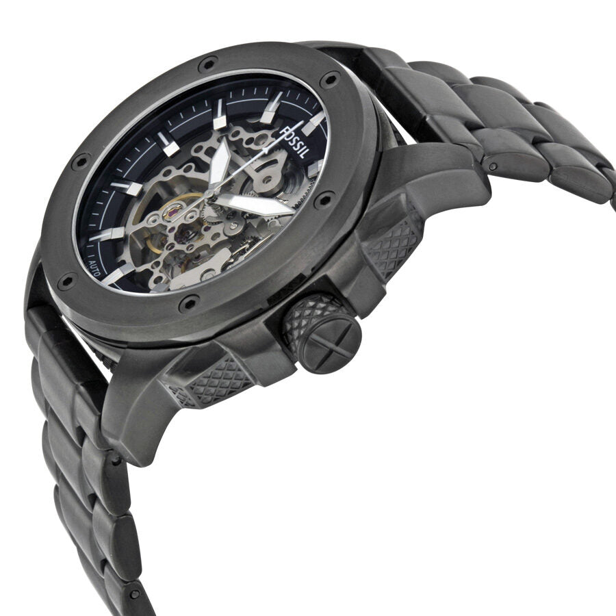 Fossil Modern Machine watch displayed at angle showing skeleton dial and side profile