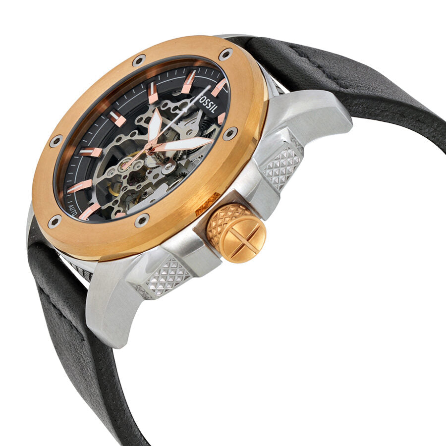 Fossil Modern Machine ME3082 side angle view showing bronze crown and two-tone case with skeleton dial
