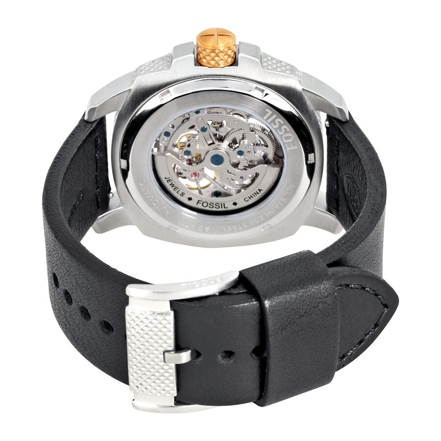 Fossil Modern Machine ME3082 caseback displaying automatic movement and black leather strap with buckle