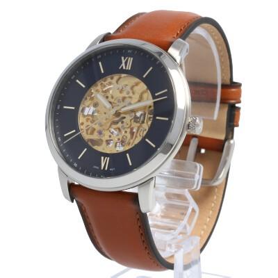 Fossil Neutra Auto watch shown at angle displaying brown leather strap and blue skeleton dial