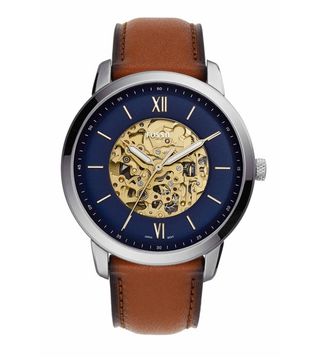 Fossil Neutra Auto automatic watch with blue dial, golden skeleton movement, and brown leather strap