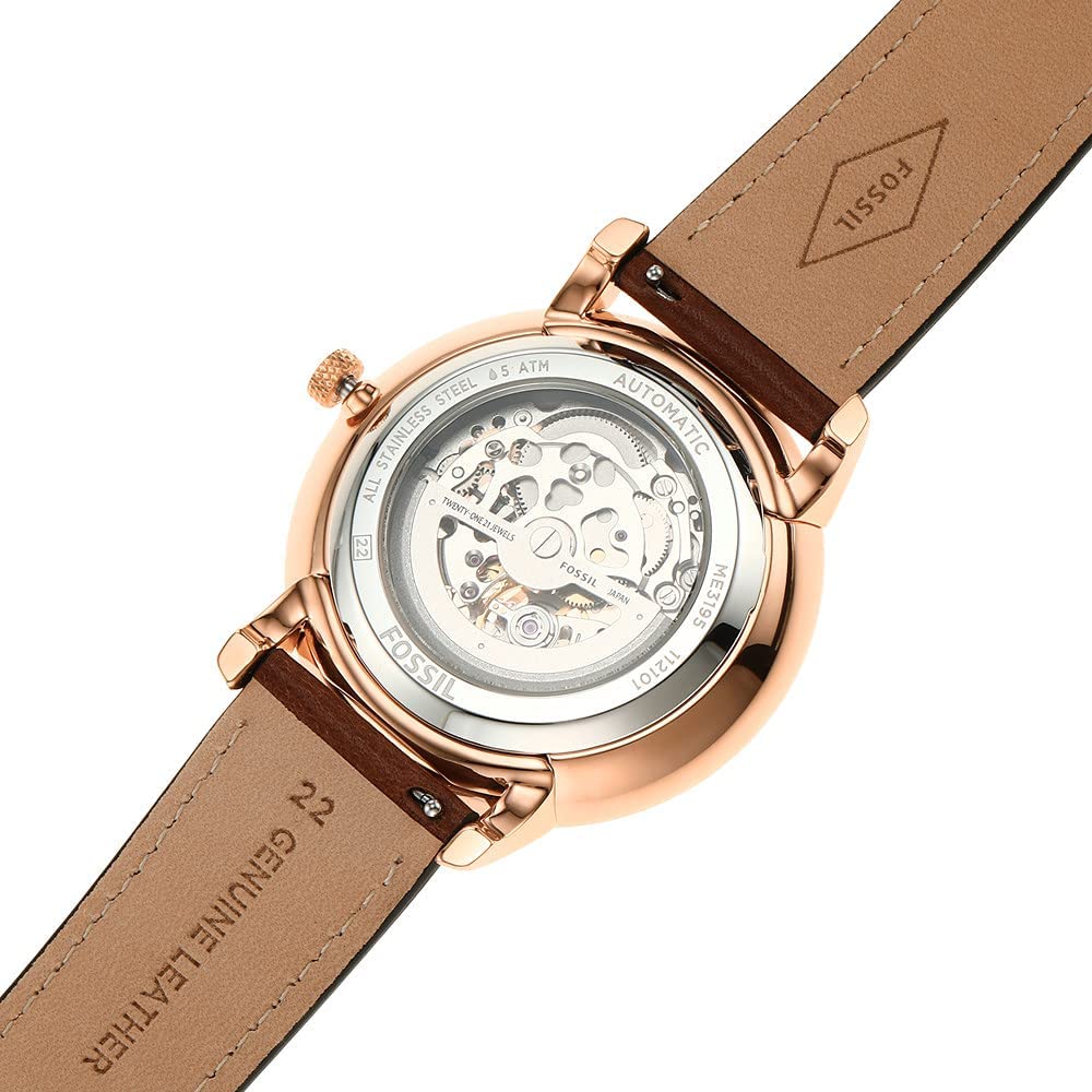 Fossil Neutra automatic movement visible through transparent caseback with rose gold case