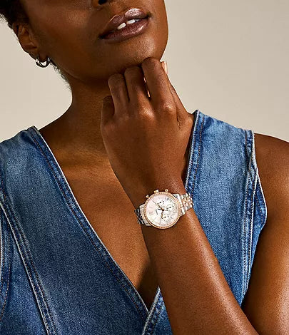 Fossil Neutra chronograph watch on wrist with two-tone band