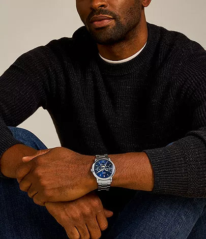 Fossil Neutra FS5907 watch worn on wrist with blue dial visible