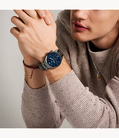 Fossil Neutra FS6111 worn on wrist with smoke stainless steel bracelet