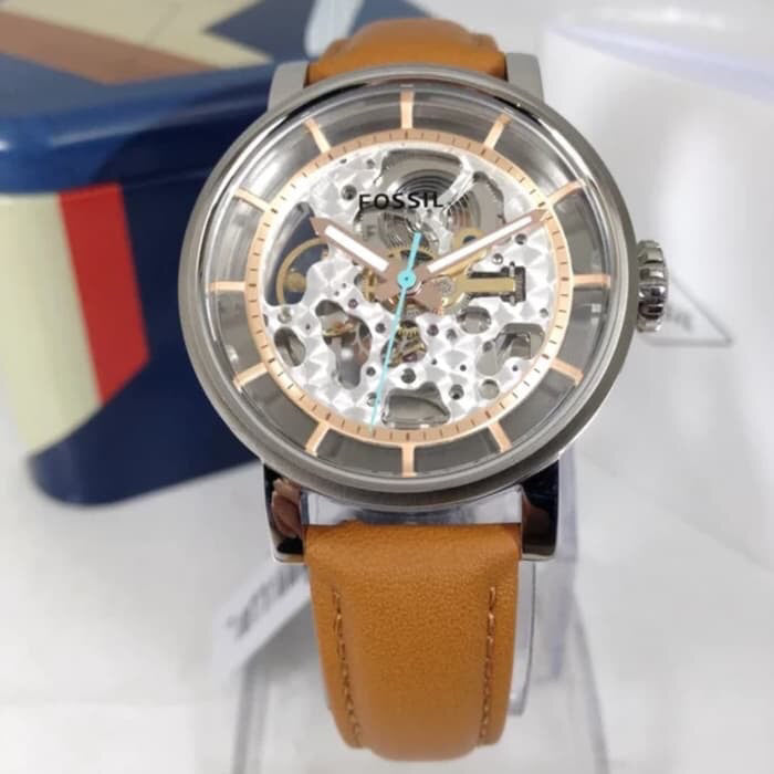 Fossil Original Boyfriend skeleton dial watch displayed with branded fabric strap