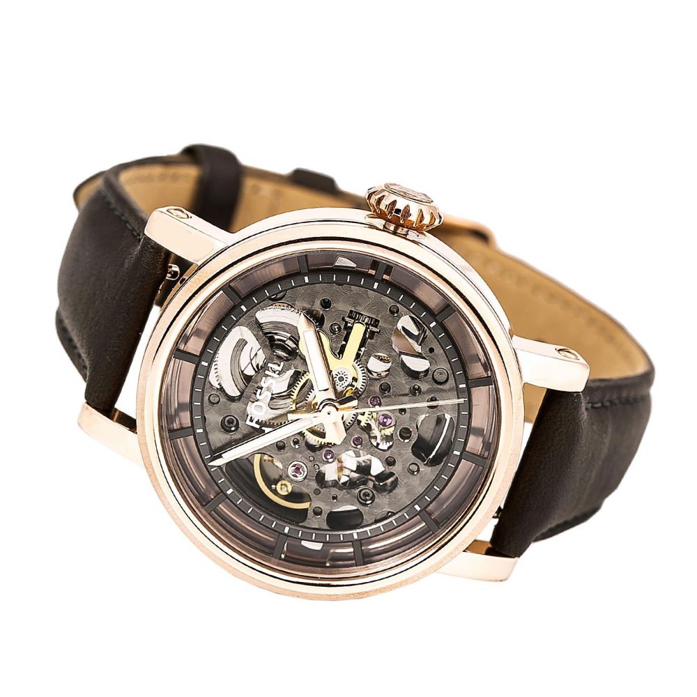 Top view of automatic skeleton watch on wrist position showing exposed movement