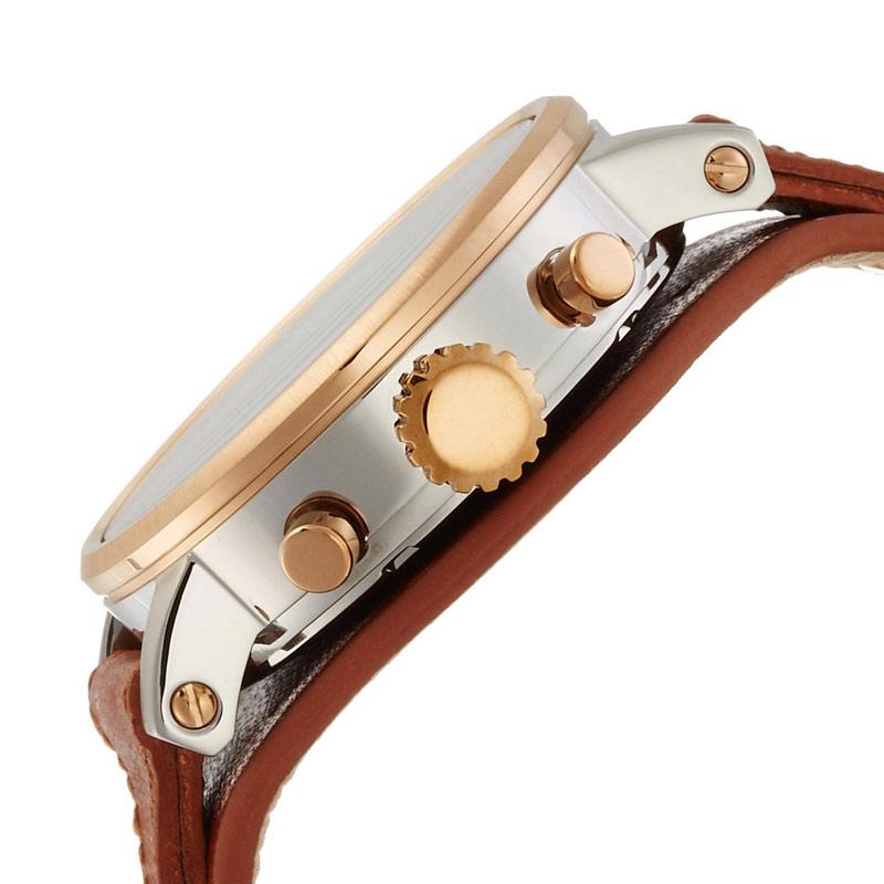 Side view of watch case showing rose gold pushers and brown leather strap