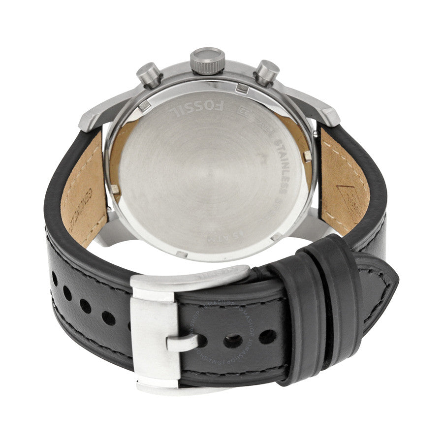 Fossil Pilot 54 caseback showing stainless steel case back with black leather strap and tan interior