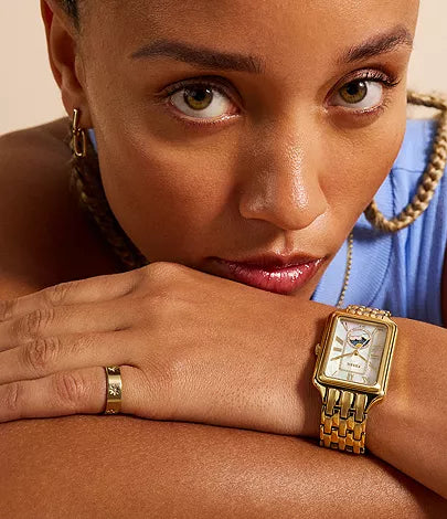 Fossil Raquel ES5398 gold-tone watch worn on wrist