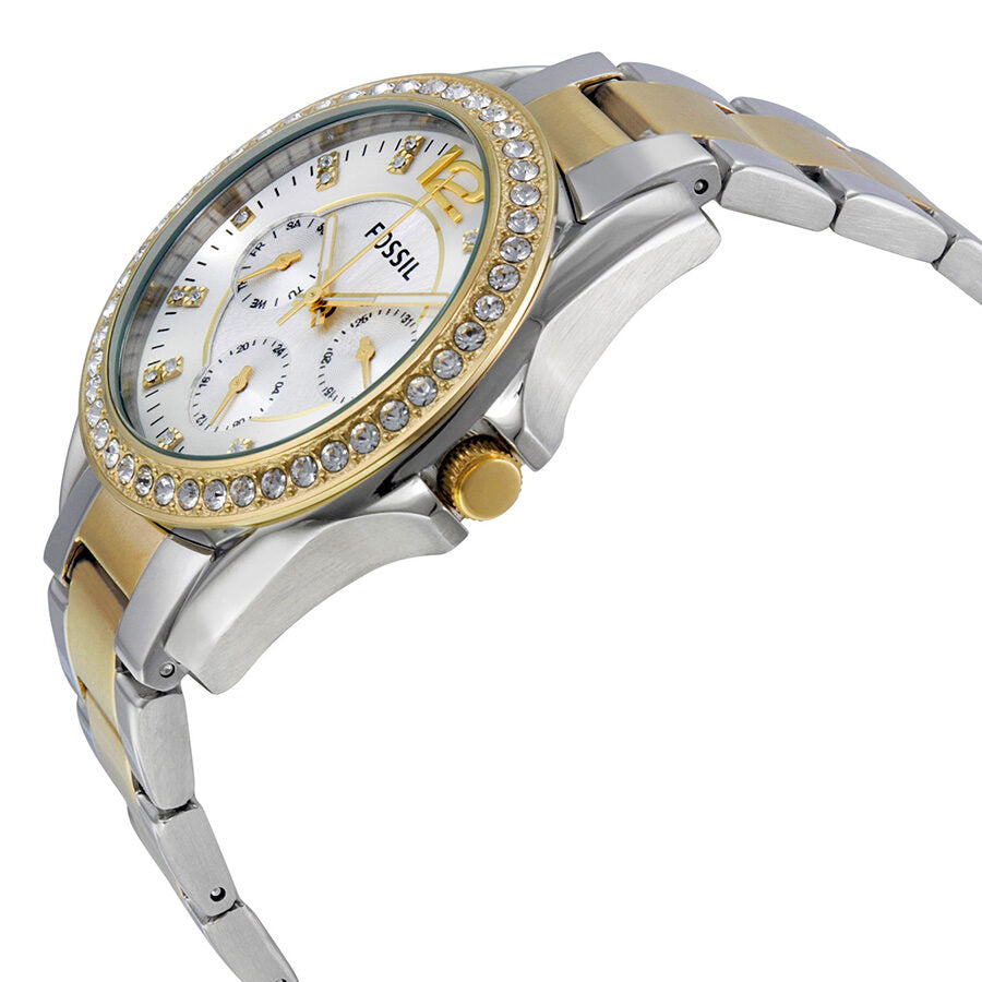 Fossil Riley watch side angle view showing two-tone gold and silver bracelet and crown