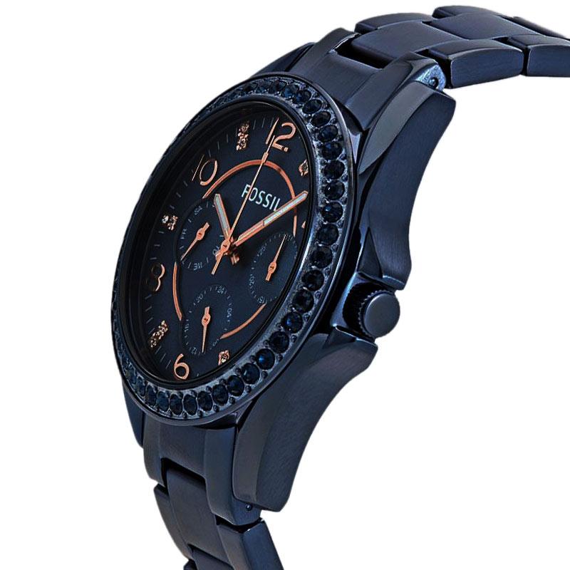 Side angle view of Fossil Riley watch showing blue steel case and bracelet with blue dial face