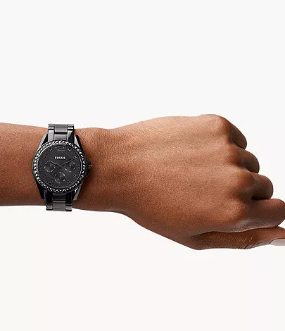 Fossil Rilry watch worn on wrist showing black chronograph dial and bracelet