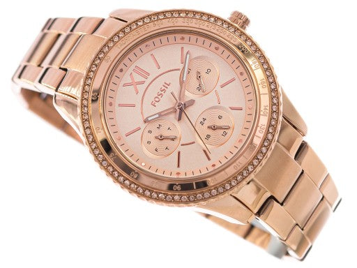 Fossil Stella Chronograph angled view with rose gold dial, chronograph subdials, and rose gold band
