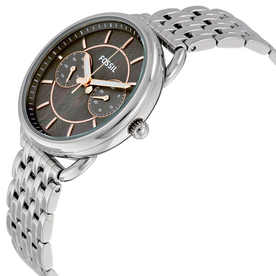 Angled view of Fossil Tailor watch showing gray dial with multi-function subdials and stainless steel link bracelet