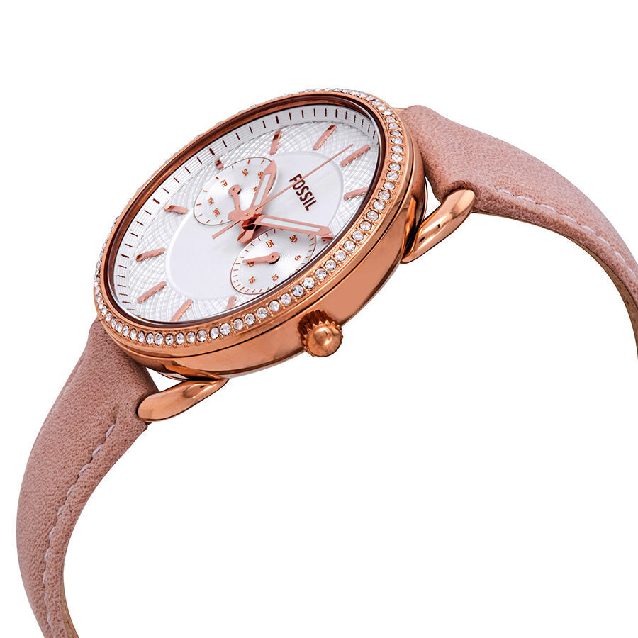 Fossil Tailor watch side view displaying rose gold case, crystal bezel, and pink leather strap