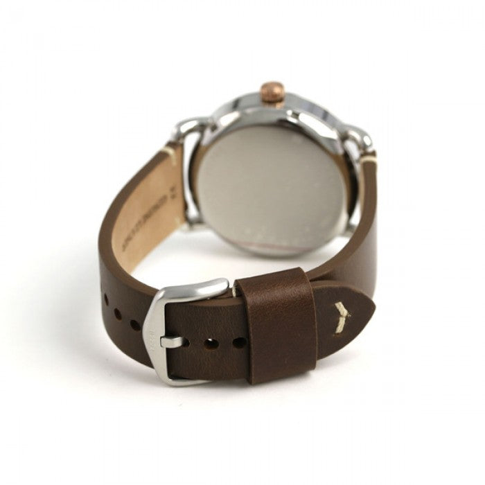Caseback view of Fossil The Commuter watch with brown leather strap