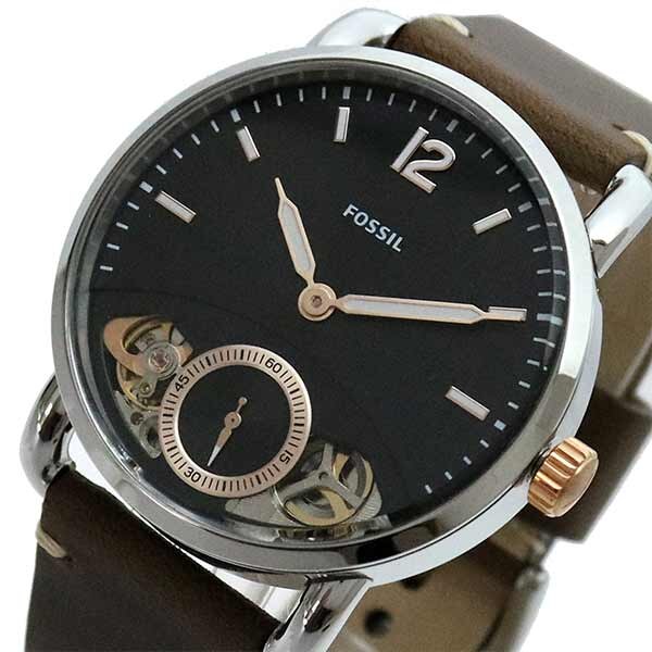 Close-up of Fossil The Commuter black dial with skeleton window and hour markers