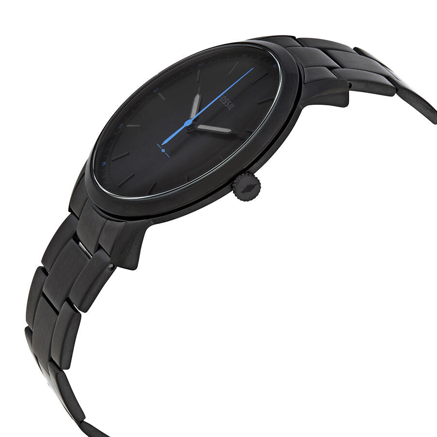 Side angle view of Fossil The Minimalist watch showing round case profile and metal bracelet