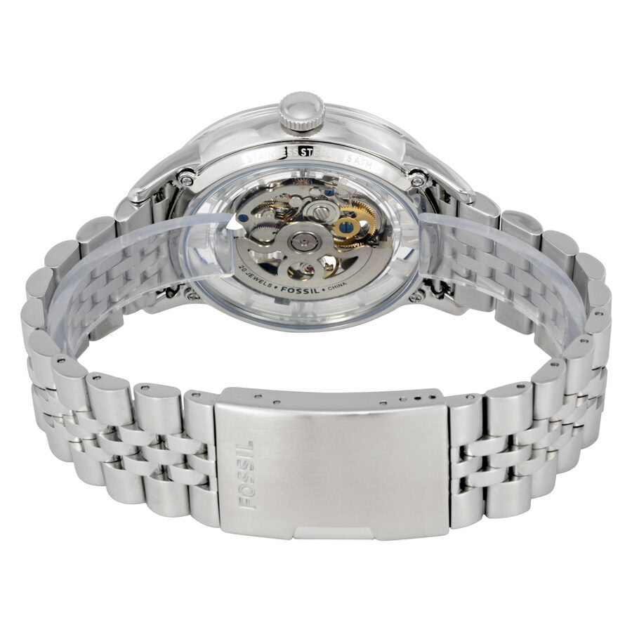 Fossil Townsman watch caseback showing visible automatic movement and stainless steel bracelet