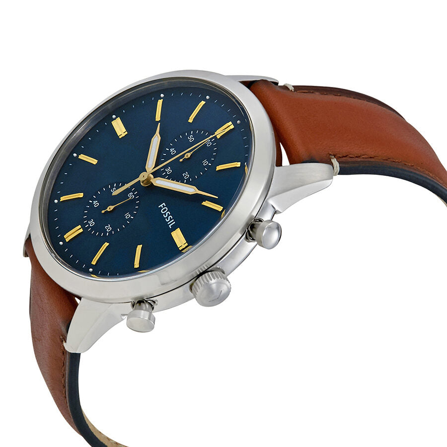 Fossil Townsman chronograph watch at angle showing blue dial with yellow indices and brown leather strap