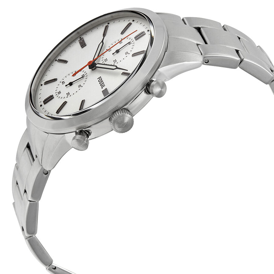 Fossil Townsman chronograph watch at angle showing white dial, subdials, and stainless steel bracelet